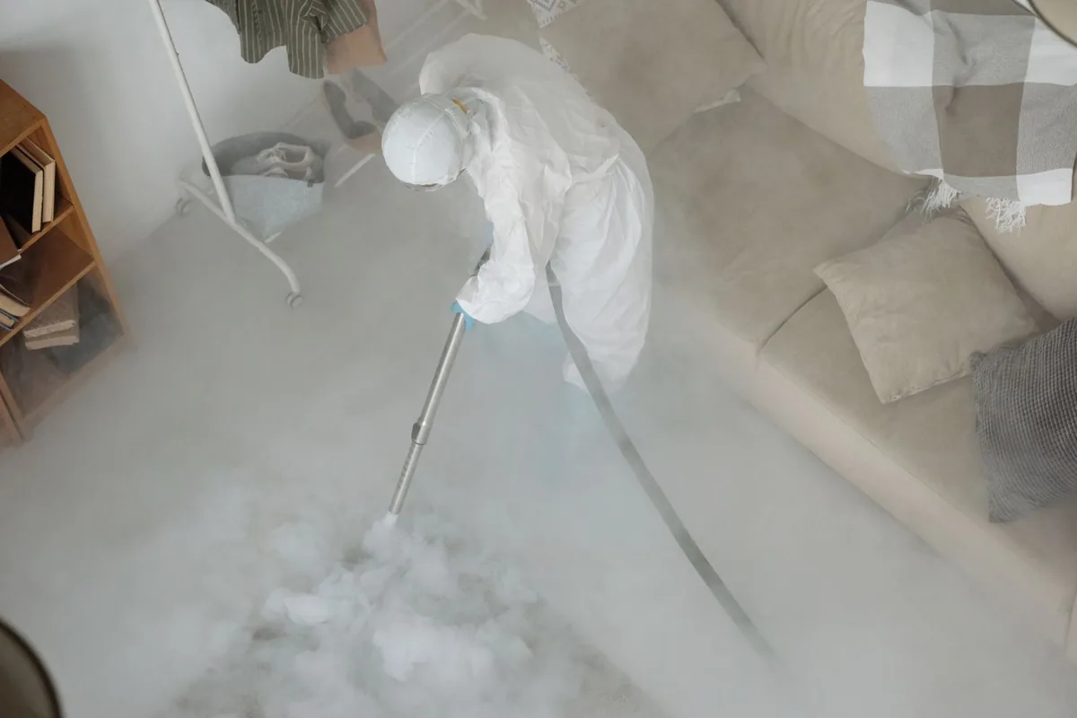 Biohazard cleanup technician in protective equipment, Maple Tree, Milwaukee, WI